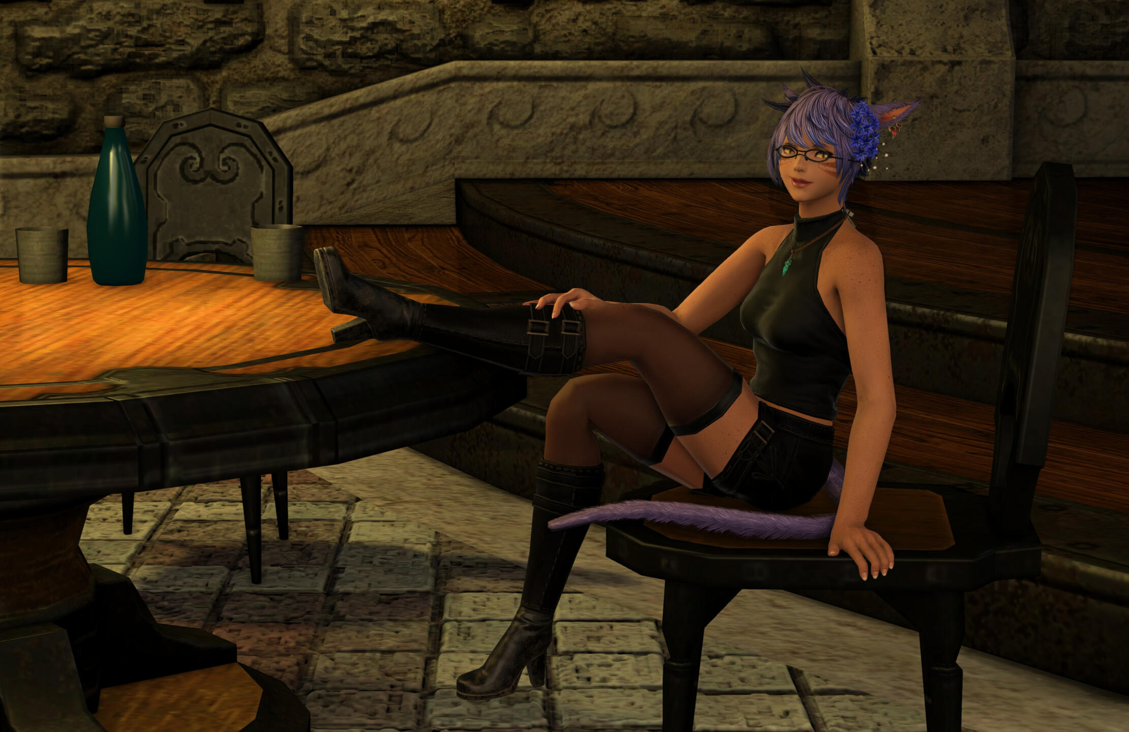 K'anra sitting at a table in black shorts and heeled thighboots, one foot on the table and a hand resting on her leg.